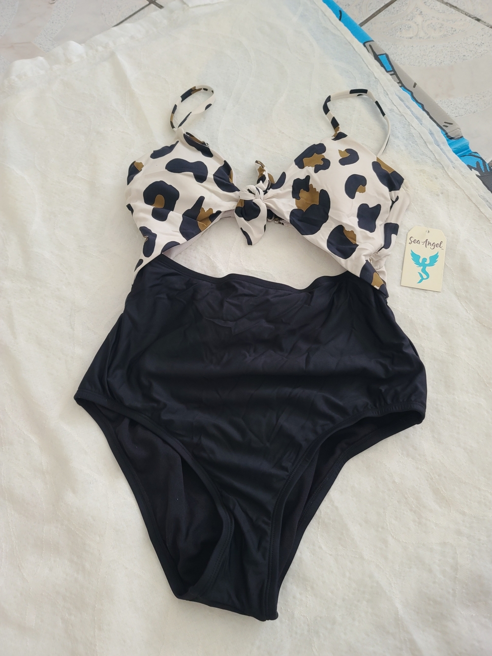 Sea Angel Women's Cutout One-Piece Bodysuit in Black and White Leopard